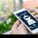 artificial-intelligenceai-chat-bot-concept-hands-holding-mobile-phone-on-blurred-abstract-background-chatbot-answering-questions-online-robot-assi-REYPR9